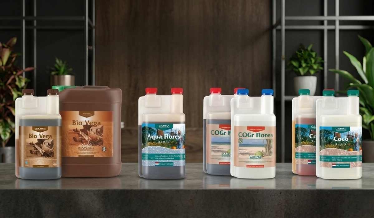 Canna Dünger Produktpalette – Bio Vega 1L und 5L, Aqua Flores A, COGr Flores A und B sowie Canna Coco A und B auf Marmor-Theke für Indoor Cannabis Anbau
